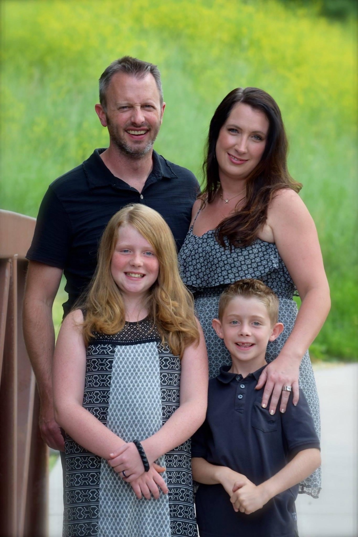 Family portrait on a bridge
