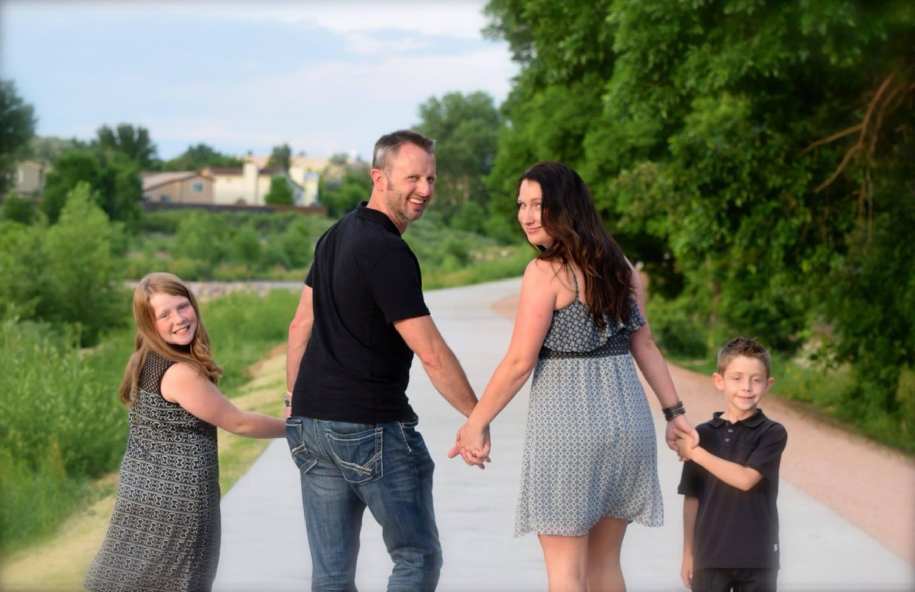 Family walking candidly outdoors
