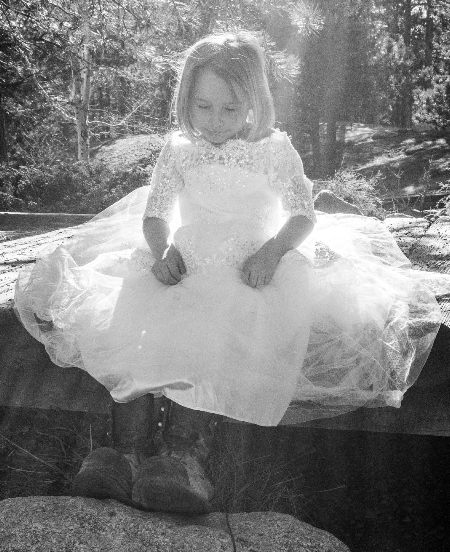 Girl in a white dress in the forest