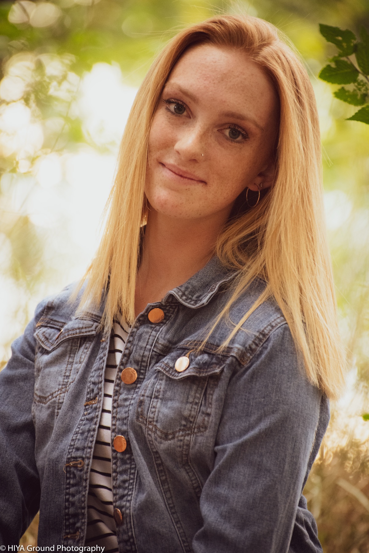Senior portrait in a denim jacket