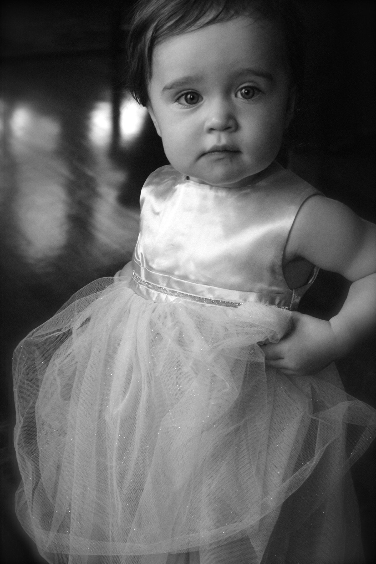 Toddler in a white dress